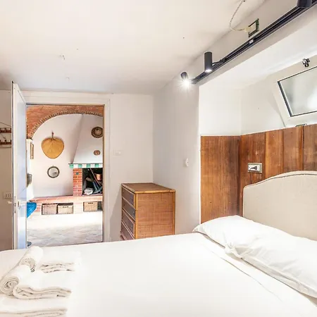 Guesthost - L'oblo - Lovely In Appartamento
